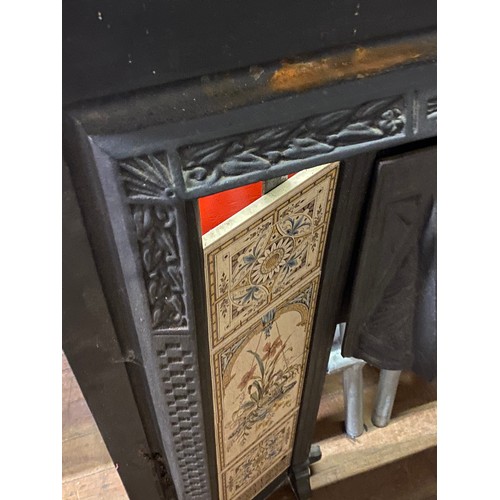 209 - Original Stovax cast iron fire insert with tiles. 98cm tall x 97cm wide.