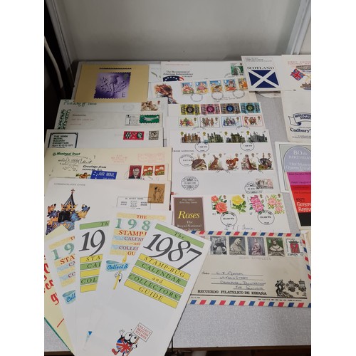 229 - Large collection of first day covers and stamp book.
(4)