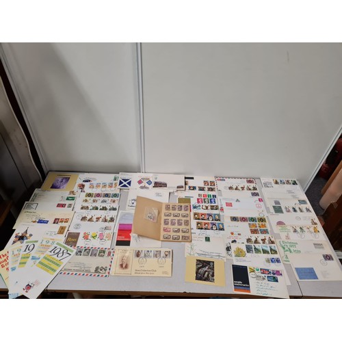 229 - Large collection of first day covers and stamp book.
(4)