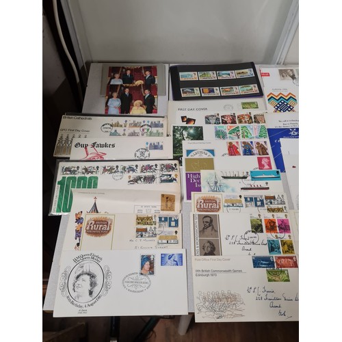 229 - Large collection of first day covers and stamp book.
(4)