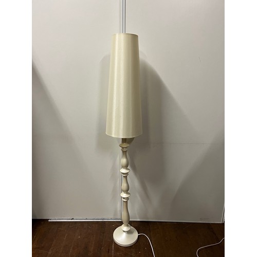 305 - Cream floor lamp with shade.