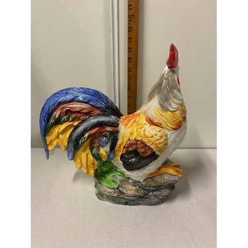 12 - Large ceramic hand painted hen and cockerel figures.
Tallest approx 38cm