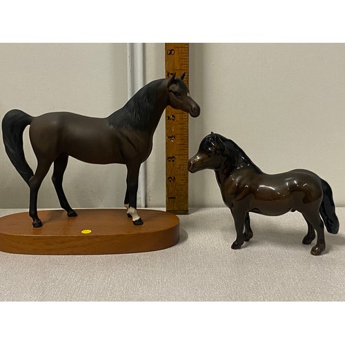 13 - Beswick Matt horse on wooden stand along with Beswick Shetland pony.
Tallest approx 18cm