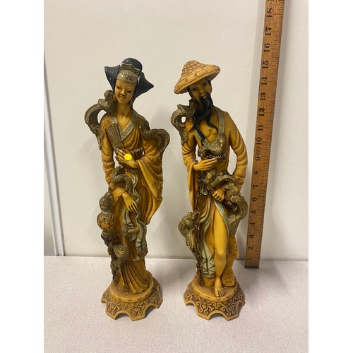 20 - Pair of tall Chinese figures.
Tallest 38cm