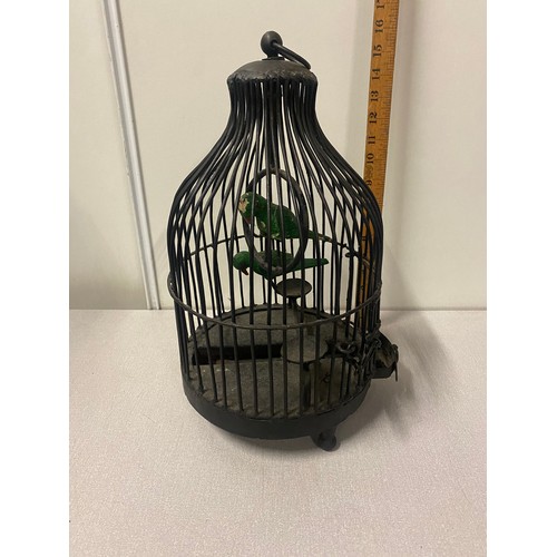 22 - Vintage decorative bird cage with pair of love birds.
40cm h