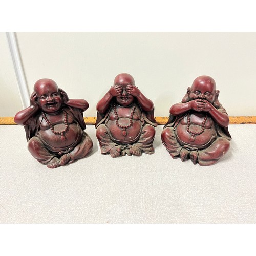 31 - 3 laughing/wise Buddha figures - hear no evil, see no evil and speak no evil.
13cm h