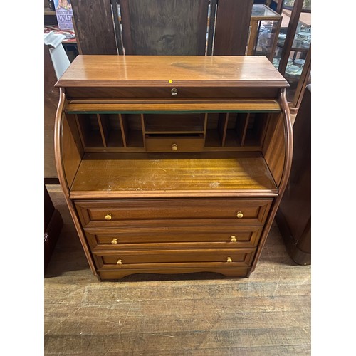 130 - Teak roll top desk with pull out desk and key.
103cm h x84cm w x 52cm d