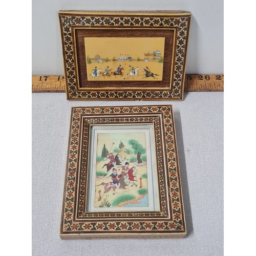 42 - Pair of hand painted miniature Chinese paintings in inlaid frame.
largest 17cm x 13cm