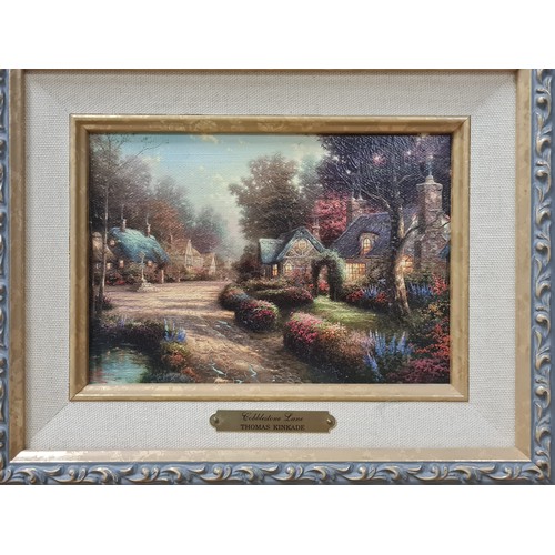 43 - Pair of framed Thomas Kinkade litho canvas prints 