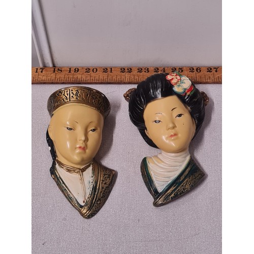 47 - Vintage Chinese couple bust wall hangings.
Longest 18cm