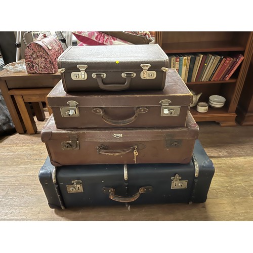 68 - 4 vintage suitcases.