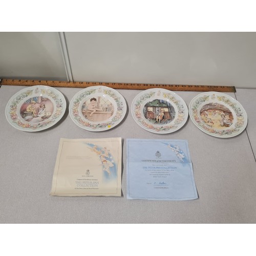 106 - Set of 4 Royal Worcester The Peter Pan collection plates with certificate of authenticity.
21cm diam... 