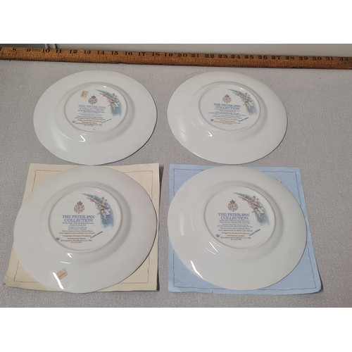 106 - Set of 4 Royal Worcester The Peter Pan collection plates with certificate of authenticity.
21cm diam... 