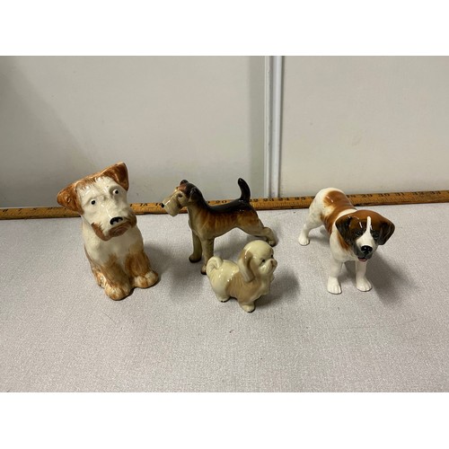 164 - 4 ceramic dogs to include midwinter etc