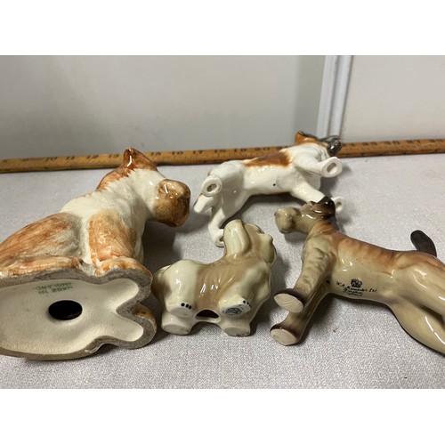 164 - 4 ceramic dogs to include midwinter etc