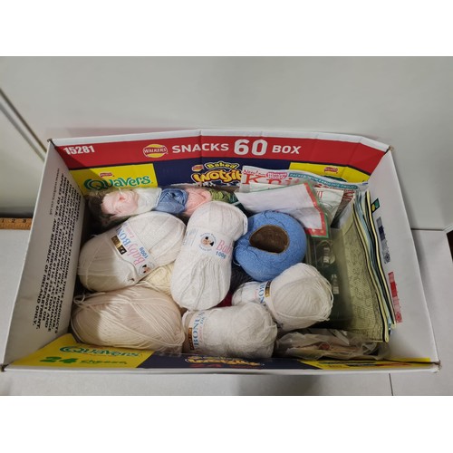 182 - Box of new wool.