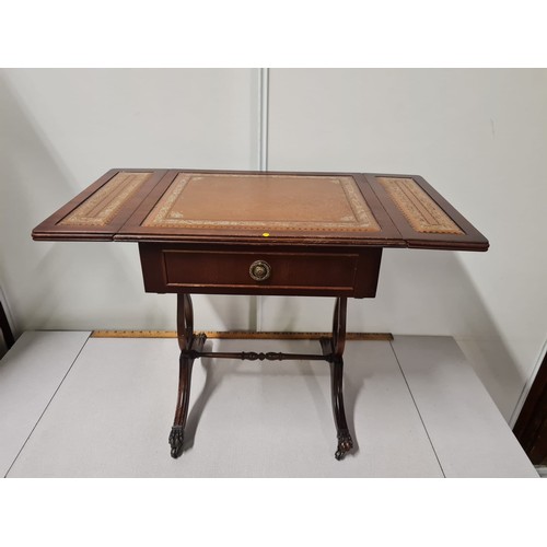 35 - Leather top, one drawer, drop leaf table on claw feet.
52cm h x 74cm w opened.