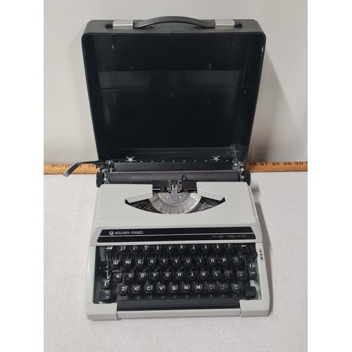 317 - Silver Reed SR 100 Tabulator Manual Portable Typewriter Grey with Case.