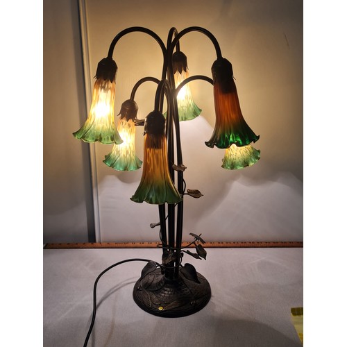 16 - Art Nouveau style six arm lamp with amber and green glass lily shades.
64cm h