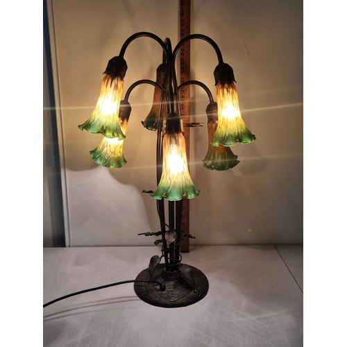 16 - Art Nouveau style six arm lamp with amber and green glass lily shades.
64cm h