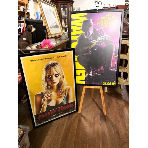 12 - 2 Large framed movie posters - Watchmen and Planet Terror.
66xm x 96cm