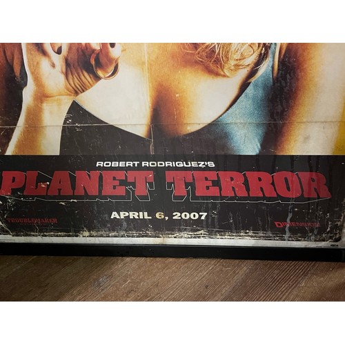 12 - 2 Large framed movie posters - Watchmen and Planet Terror.
66xm x 96cm