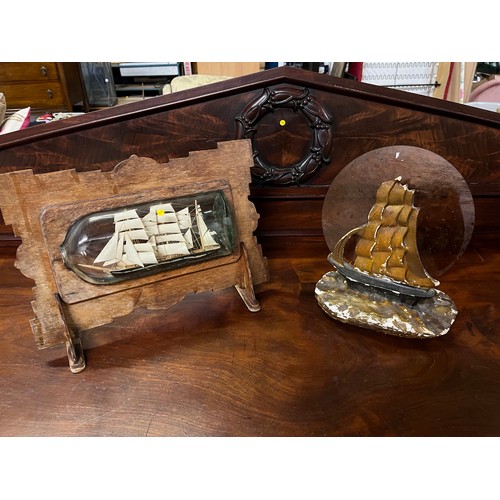 40 - Antique Ship in a bottle in wooden stand along with 1920's sailboat lamp with glass moon shade (need... 