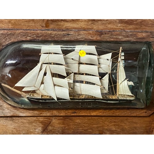 40 - Antique Ship in a bottle in wooden stand along with 1920's sailboat lamp with glass moon shade (need... 