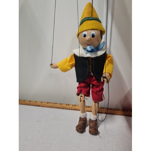 51 - 2 vintage wooden puppets to include Pinocchio.
Tallest 69cm