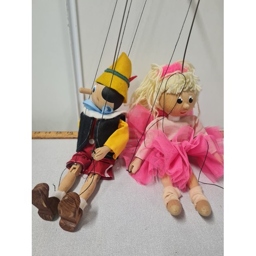 51 - 2 vintage wooden puppets to include Pinocchio.
Tallest 69cm