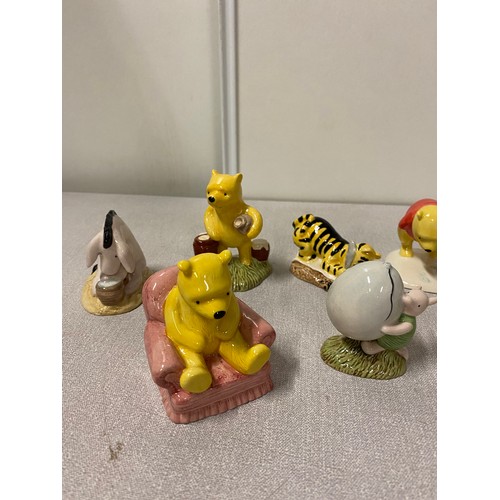 66 - Collection of 10 Royal Doulton Winnie The Pooh collection figurines.