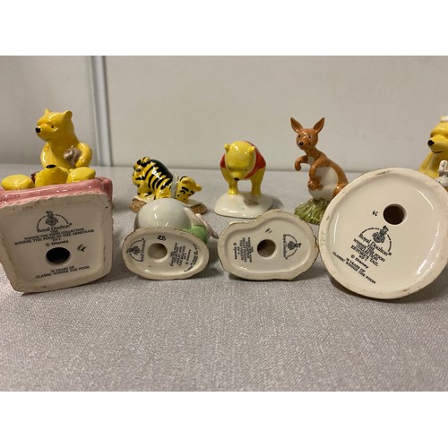 66 - Collection of 10 Royal Doulton Winnie The Pooh collection figurines.