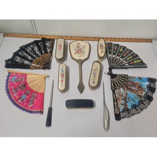 143 - 4 vintage fans,brush set & 2 letter openers