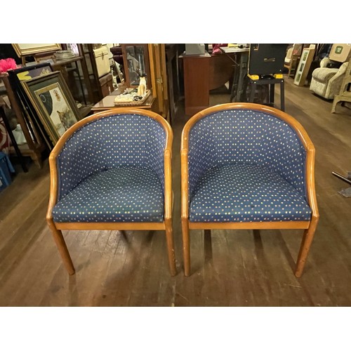 38 - Pair of oak framed bucket chairs.