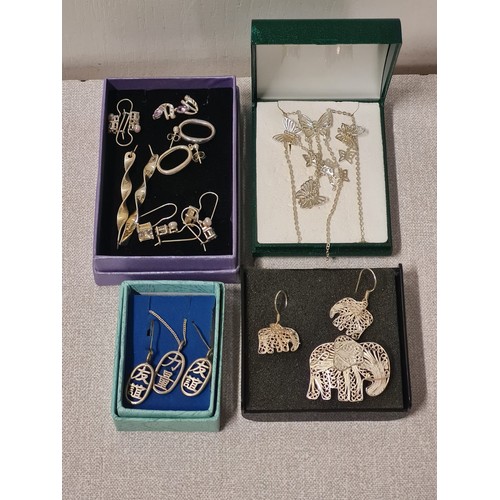 49 - selection of silver to include earings, elephant set etc