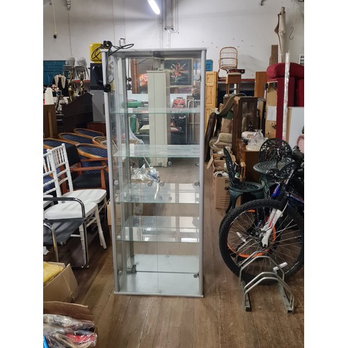 96 - Glass light up display cabinet. 168cm tall 65cm x 33cm