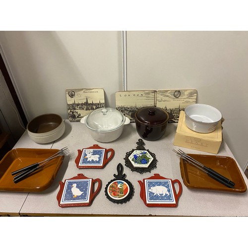 11 - Selection of kitchenalia to include Denby soufflé dish, trivet stands and French serving dishes etc.