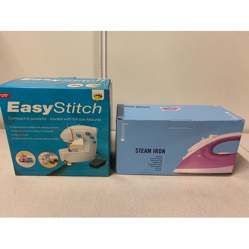 302 - New Easy Stitch compact sewing machine and Elevation steam iron.