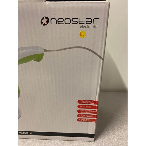 303 - New boxed Neostar UV Bed vacuum.