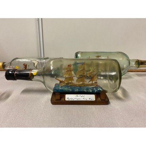 110 - Collection of 5 glass ships in bottles. 2 signed Jamieson 1977/78