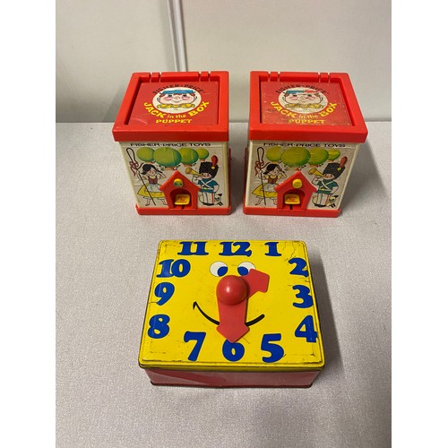 67 - 2 vintage Fisher Price Jack in the box puppets along with tin clock lunch box.