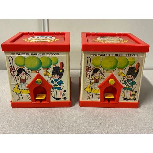 67 - 2 vintage Fisher Price Jack in the box puppets along with tin clock lunch box.