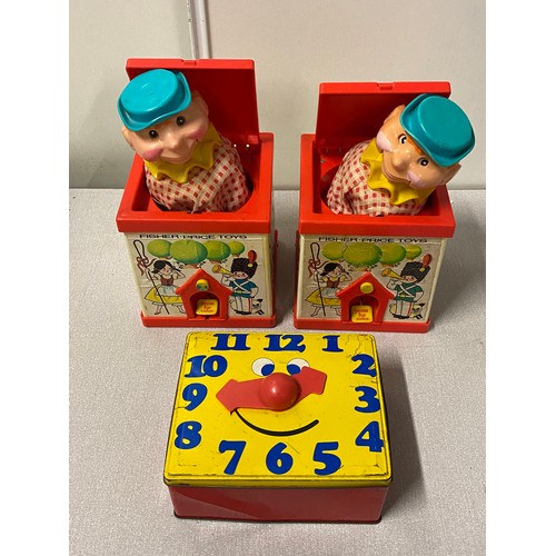 67 - 2 vintage Fisher Price Jack in the box puppets along with tin clock lunch box.