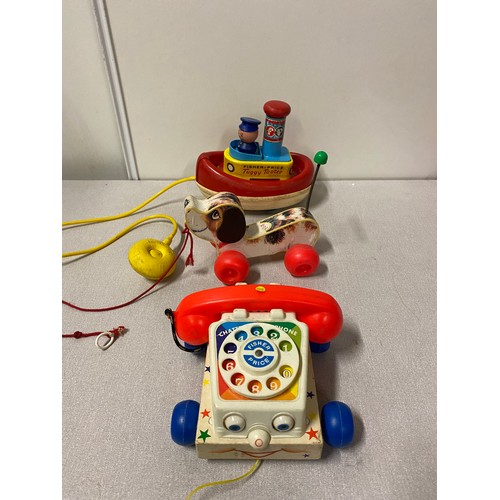 317 - 3 vintage Fisher Price toys - Tuggy Tooter, pull along dog and telephone.