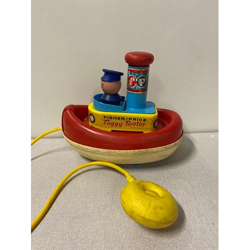 317 - 3 vintage Fisher Price toys - Tuggy Tooter, pull along dog and telephone.