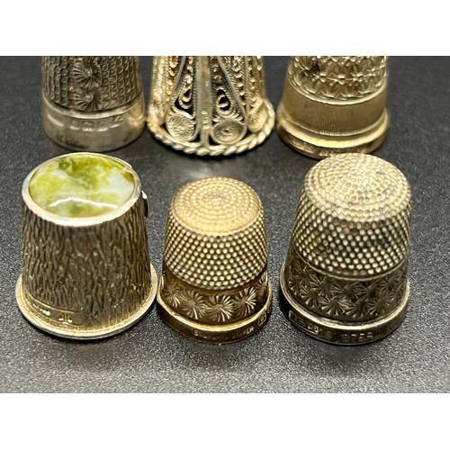 6 ornate silver thimbles