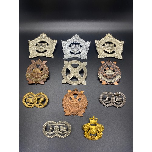 53 - Collection of 11 military cap badges to include Calgary Highlanders and Argyle and Sutherland.