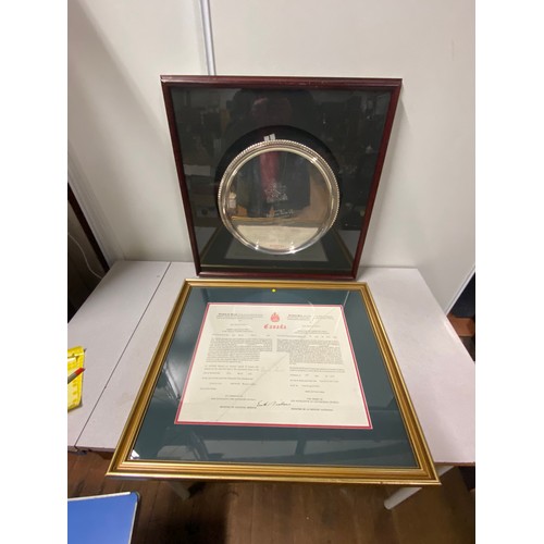 452 - Canadian Armed Forces discharge paper in gilt frame along with framed military retirement plated tra... 