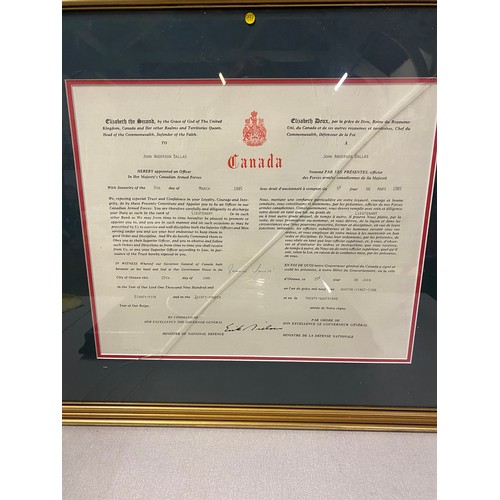 452 - Canadian Armed Forces discharge paper in gilt frame along with framed military retirement plated tra... 