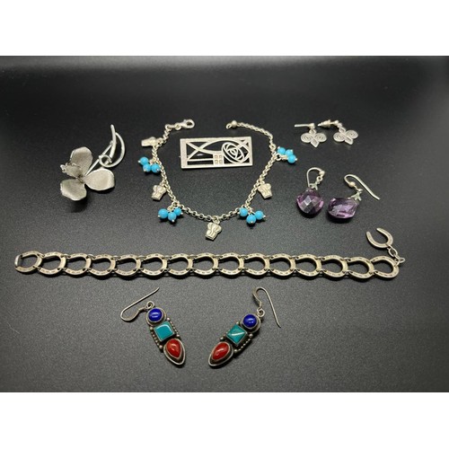 55 - Qty of silver jewellery to include brooch, earrings and bracelets.